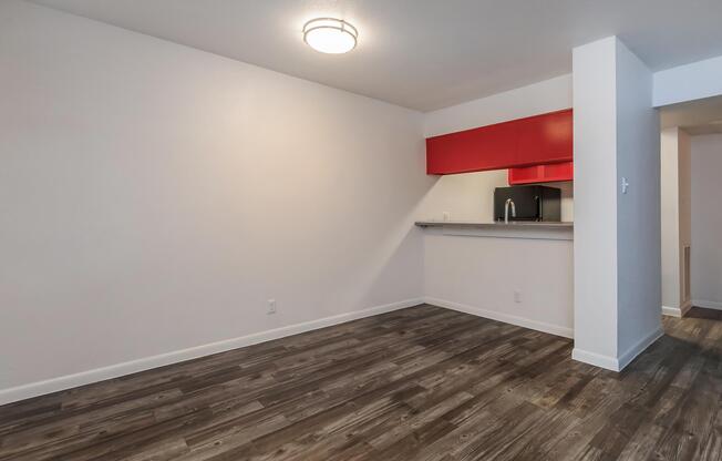 a kitchen with a wood floor