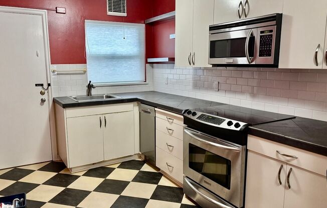 "Lovely Updated Condo in the Sullivan's Gulch Neighborhood" Water/Sewer/Trash & Heat Included in the Rent. Pet Friendly and Washer & Dryer in the Unit!