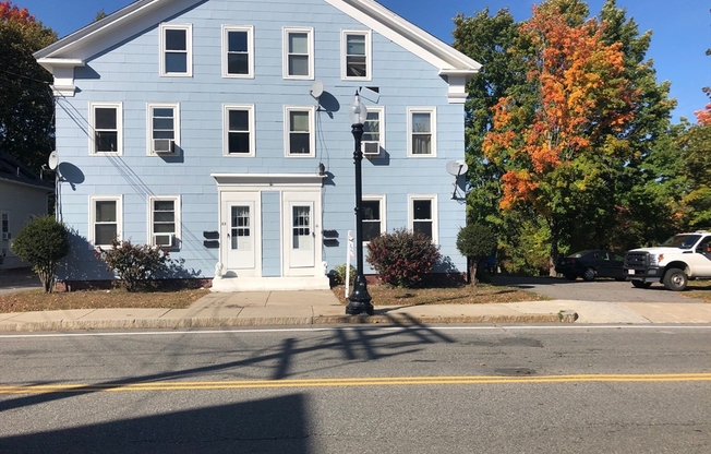 61 63 W MAIN ST