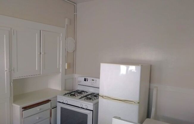 Unit has newer appliances and flooring in bathroom