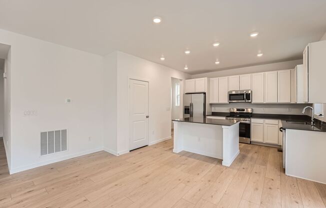 ALMOST BRAND NEW exquisite 3bd home in Harvest Ridge community