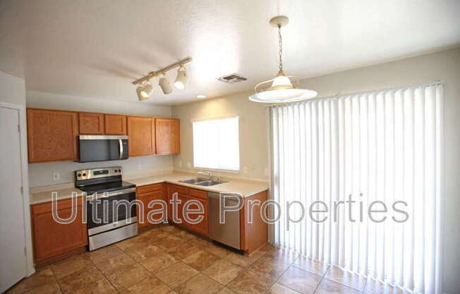 12203 W WINDROSE DR