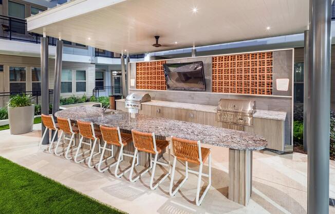 Savor outdoor living with lush greenspace, a beautiful courtyard, and grills perfect for your next gathering.