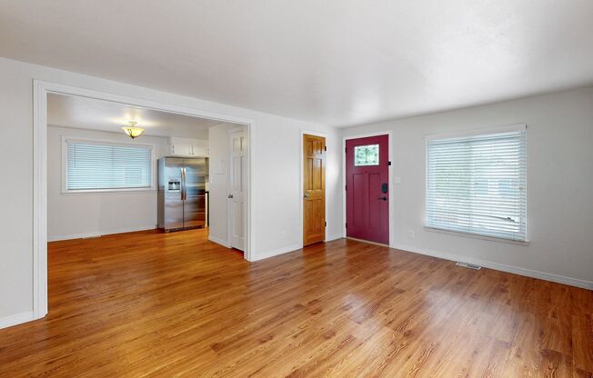 Spacious updated 3 bed/3 bath home w/AC and fenced in back yard