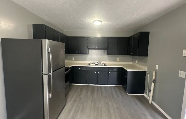 FIRST FULL MONTHS RENT FREE!! 2 Bedroom Duplex with Huge Back Yard!