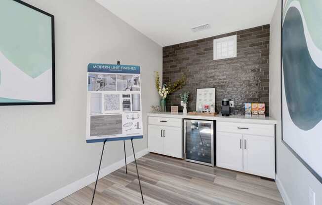 the preserve at ballantyne commons community room with counter and refrigerator and bulletin board at Sunnymead Apts Apartments, Moreno Valley