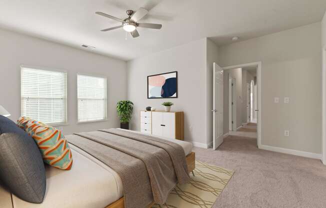 Primary Bedroom with Ceiling fans and extra Windows