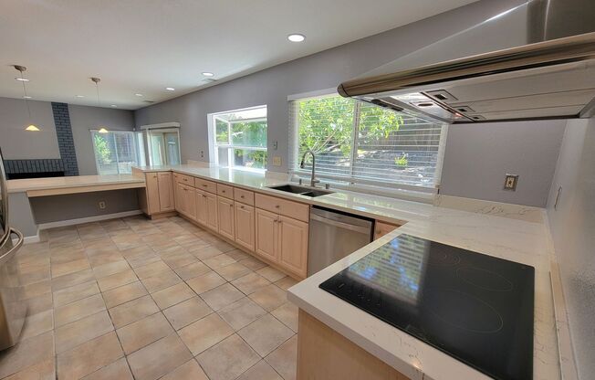 Spacious Beauty with Remodeled Kitchen and your Own Backyard Oasis!