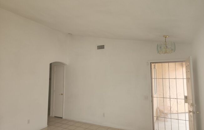 Single story with tile flooring and gas fireplace.