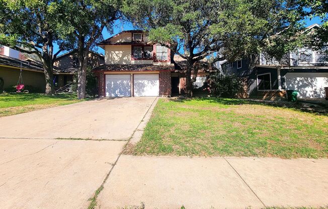 Warm & Inviting 4BR / 2.5BA Home with Covered Deck and 2-Car Garage