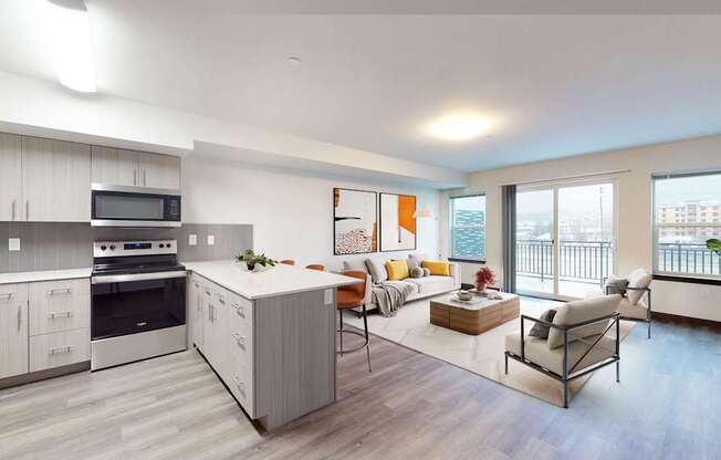 A modern kitchen with a dining area and a balcony.