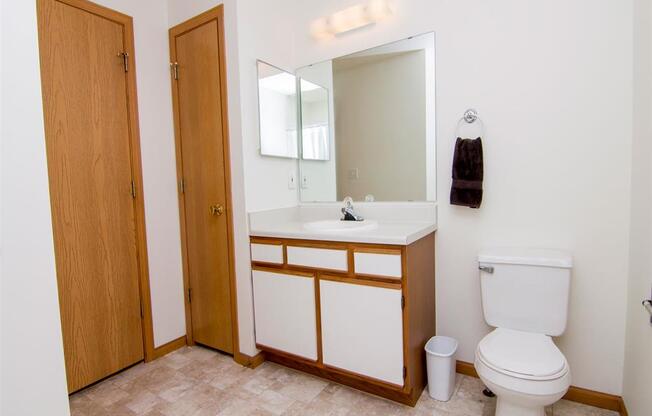 Spacious bathroom with linen closet storage at Northbrook Apartments in Lincoln NE