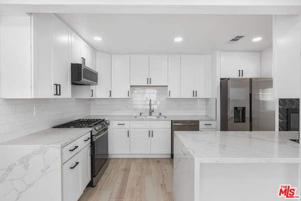 1613 W 209 ST