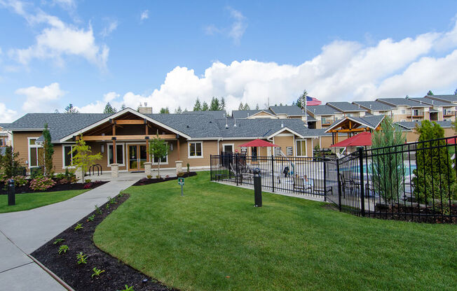Clubhouse with pool and fence
