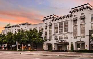 The front of a hotel called The Village.