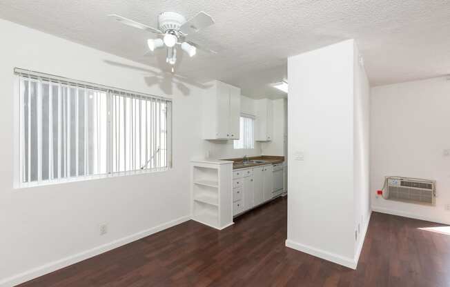 Dining Room with Hardwood Floors and Fan