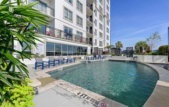 Our sparkling pool on the rooftop patio at Dominion Post Oak apartments in Houston, TX