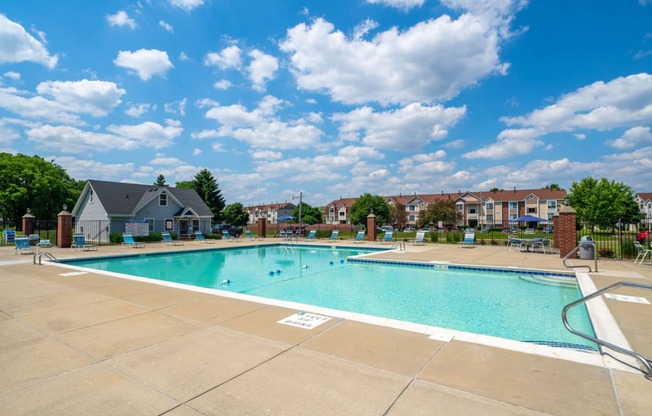 Outdoor Swimming Pool with Lounge Chairs at Indian Lakes Apartments, Mishawaka, IN, 46545