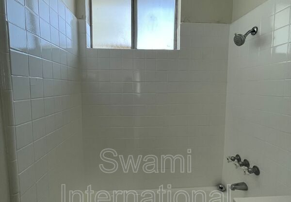 6100 11 AVE