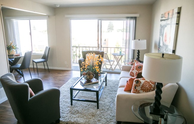 Decorated Living Room With Natural Light at Three Crown Apartments, Alameda, California