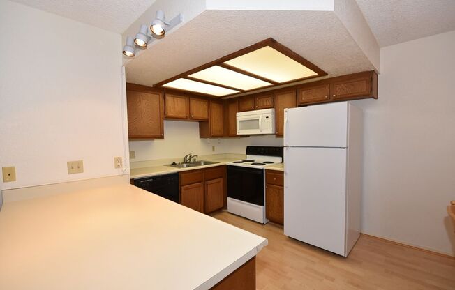 Cozy 2-Bedroom Condo at The Lakes – 2nd Floor!