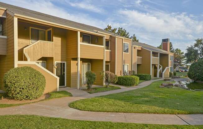 Exterior Patios or Balconies Overlooking the Lush Grass