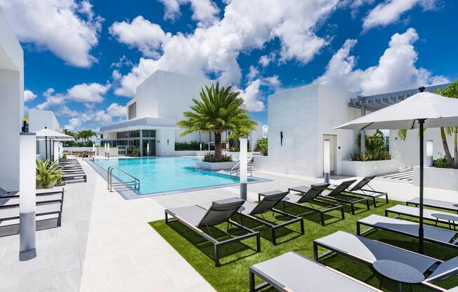 Soak up the Miami sun by Modera Riverside’s resort-style rooftop pool and lounge deck.