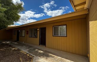 Central (Grant and  Dodge) single story apartment complex, a/cs, private fenced yards and laundry on site!