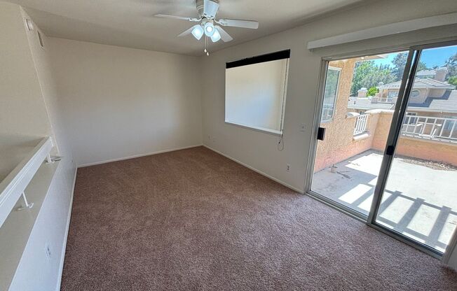 Spacious 2-Bedroom Condo with Loft & Resort Amenities in Gated Valencia Community!