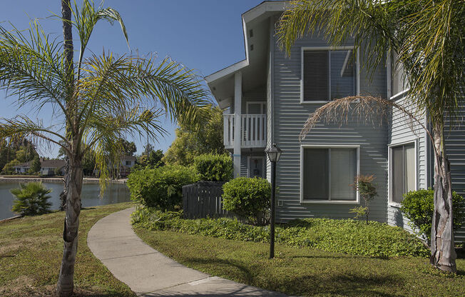 Sidwalk with landscape by buildings l Vue at the Lake in Sacramento