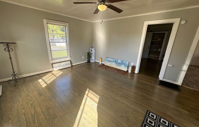 2 Bed House w/ Wooden floors, Large Front porch, Central HVAC & Huge yard!