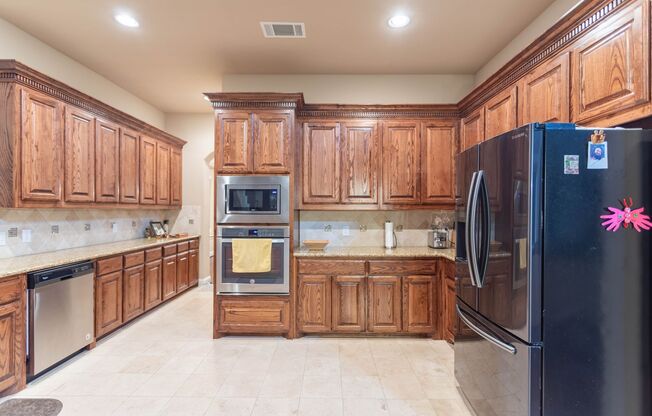 Very beautiful 5 bedroom, 4.1 bathroom house. It has 6 living areas, 2 dining areas. Hardwood floors with carpets upstairs.