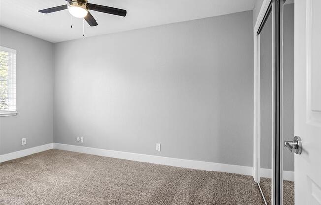 Carpeted Bedroom Space at Peninsula Pines Apartments, South San Francisco, CA