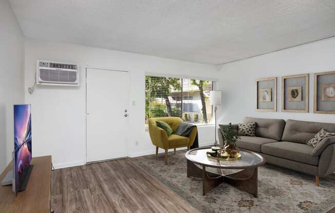 a living room with a couch and a coffee table