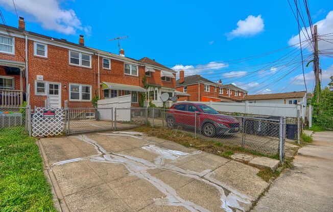 3 Bed 1 Bath Rowhome with OFFSTREET PARKING AND OUTSIDE STORAGE