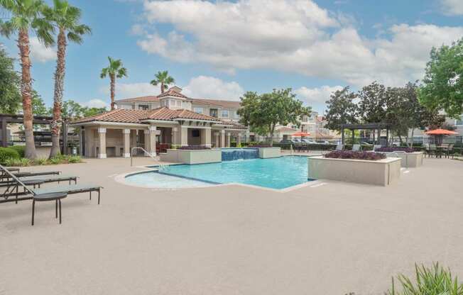 a swimming pool with a building in the background