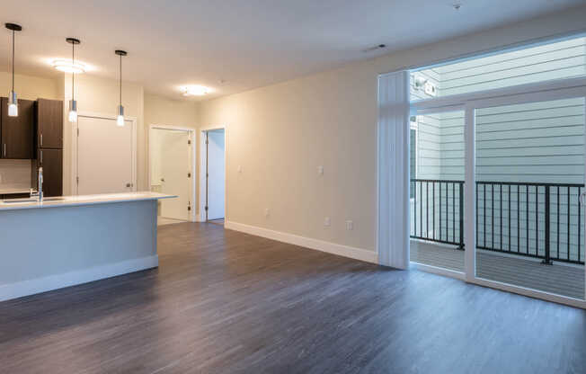 Living Room with Balcony and Hard Surface Flooring