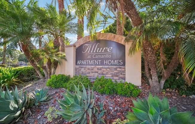 the sign at the entrance to allure apartments