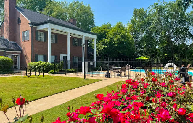 exterior view of the Littlestone Apartments clubhouse with lush landscaping