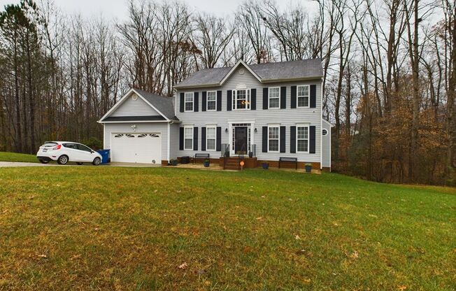 Beautiful 4-Bedroom Colonial Home with Sunroom, Deck, and Garage available February 1st!