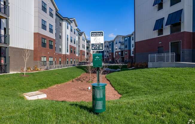 A baseball diamond in a grassy area with a sign that says "Baseball Only".