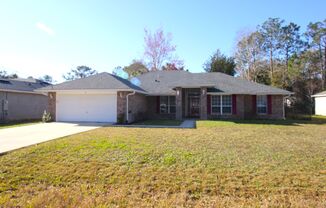 Spacious 4 Bed 2 Bath Screened Lanai Home w Fenced Yard in R Section!
