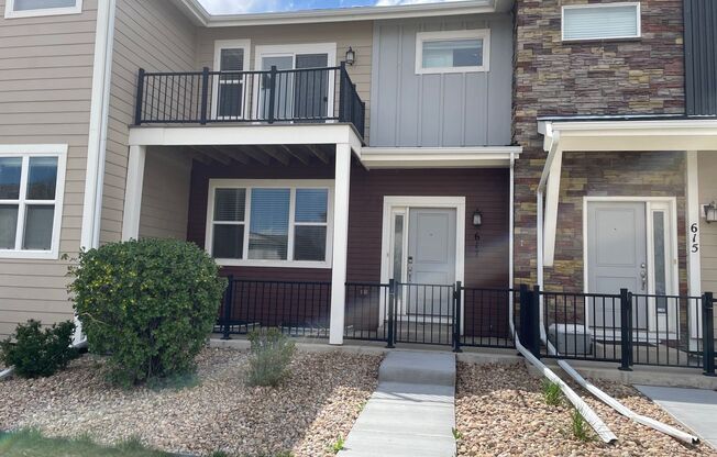 Spacious 3 level, 4 bedroom townhome with attached 2 car garage at Silver Meadows Townhomes on Longmont.