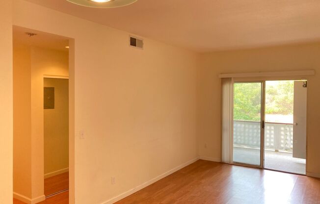 Spacious sun filled 2 bedroom with Washer/ Dryer in unit and garage!
