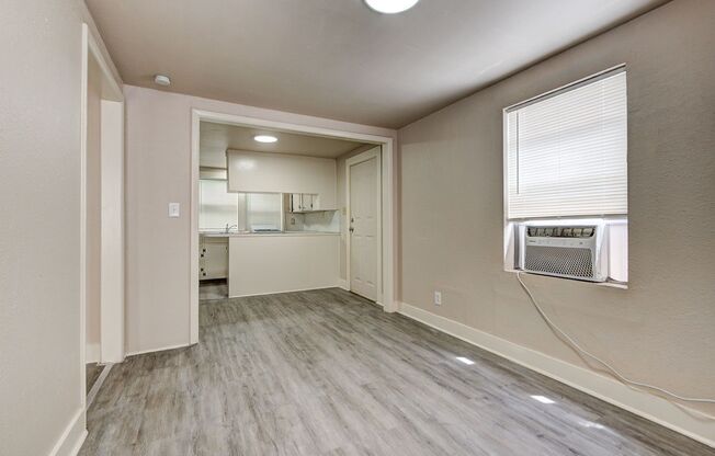 Charming Home Near Midtown: Wood Flooring and Prime City Access! Available now!