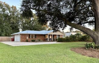 Gorgeous 4/2 Renovated Home in the Heart of Pace!!