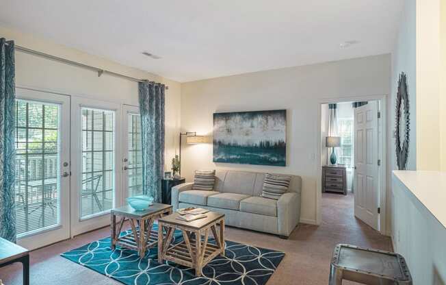 a living room with a couch and a table