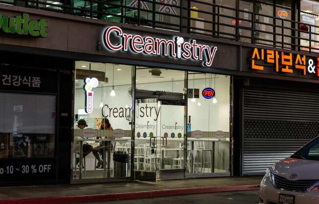 a store front with a sign that reads cream city