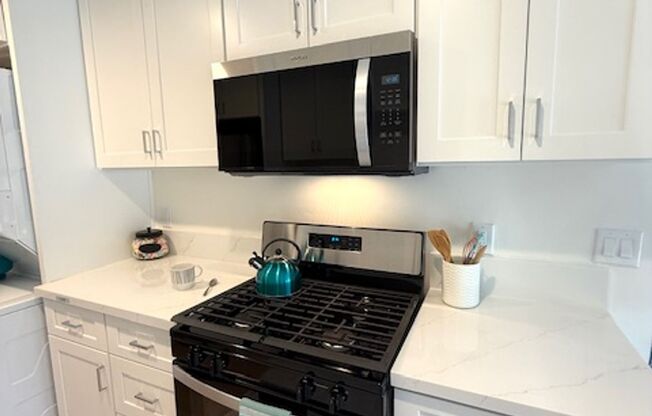 Newly Remodeled - Move-in Special $$$ New a/c, Private Balcony, Washer/Dryer in unit, New Kitchen & Bath