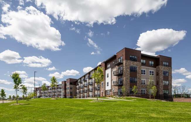 a large building with green grass in front of it